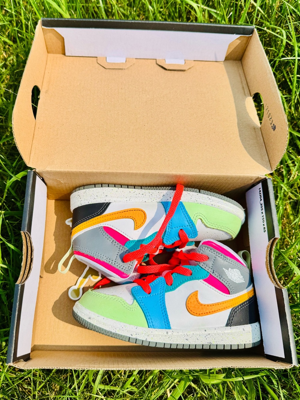 Jordan Kids Multicolor Sneakers with Orange Swoosh and Red Laces